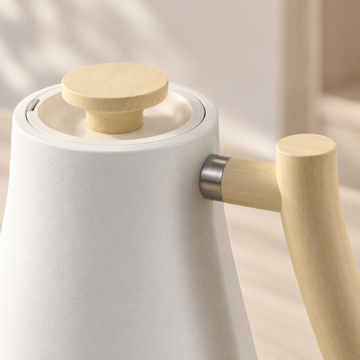 Close detail of the kettle wood, metal and soft white surfaces
